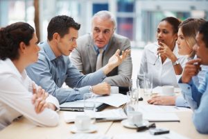 lawyers and client in offices discussing sexual assault claims